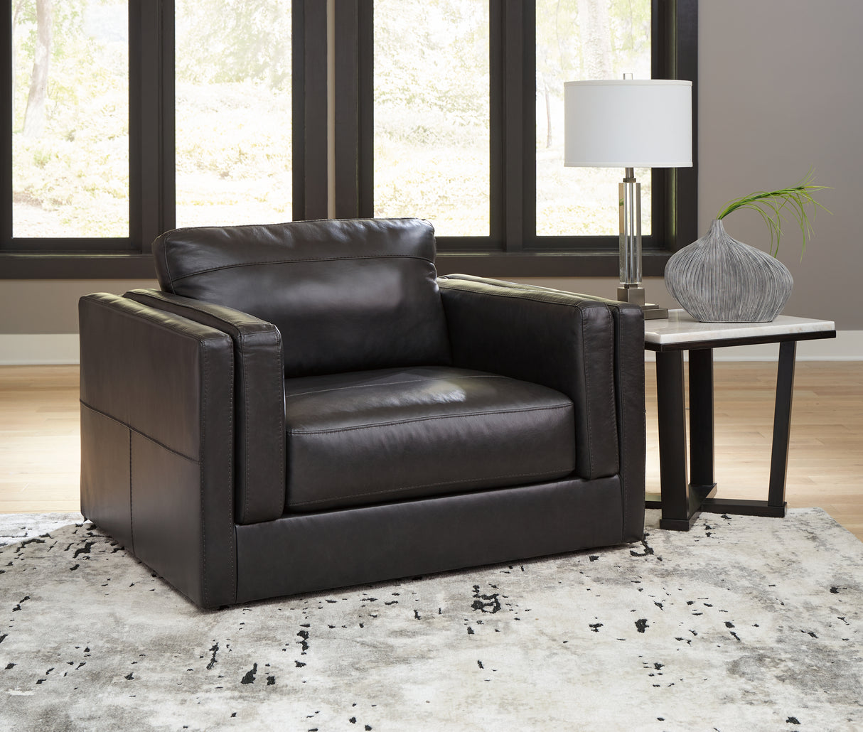 Furniture City Biloxi - Ashley Furniture - Amiata Living Room - Chair and a Half / Onyx - 5740523