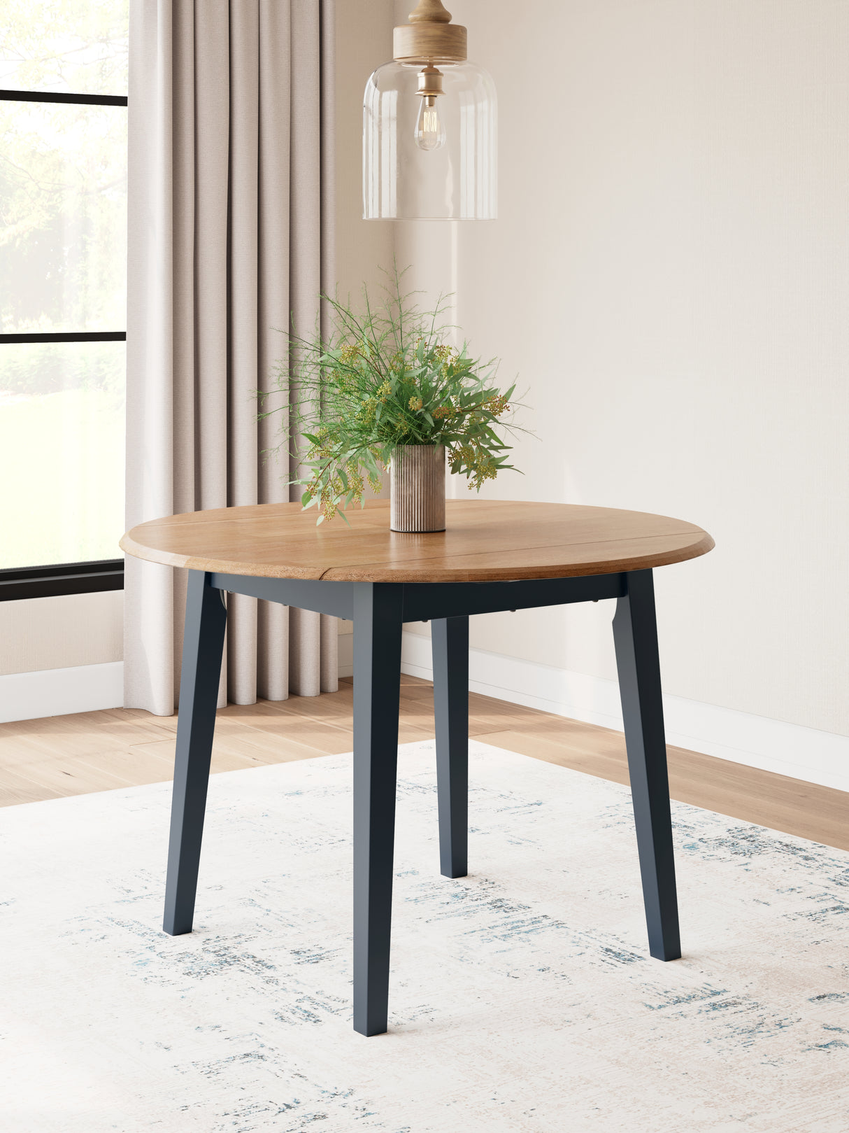 Furniture City Biloxi - Ashley Furniture - Gesthaven Dining Room - Round DRM Drop Leaf Table / Natural/Blue - D399-15