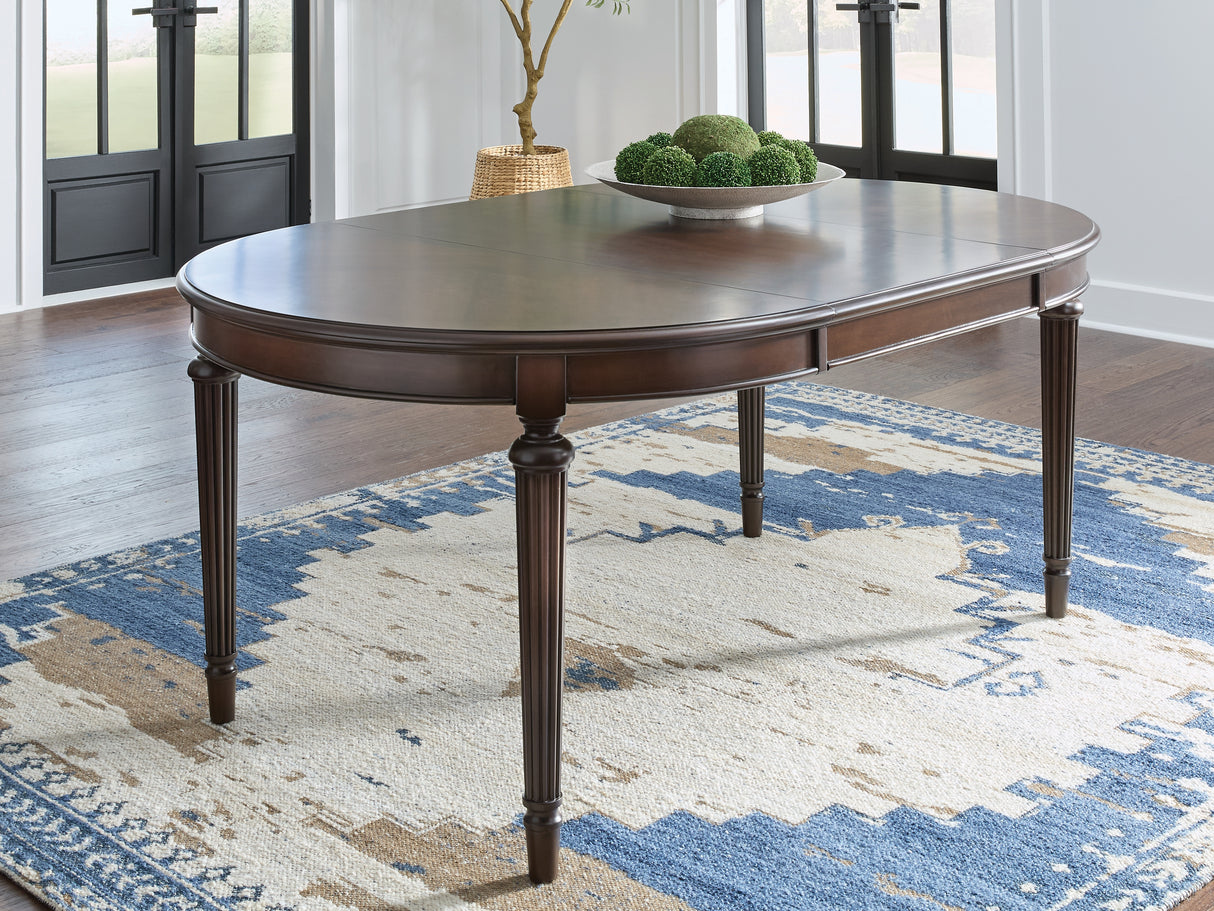 Furniture City Biloxi - Ashley Furniture - Lavinton Dining Room - Oval Dining Room EXT Table / Brown - D764-35