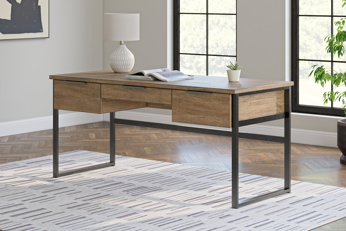 Furniture City Biloxi - Ashley Furniture - Montia Office Desk - Home Office Desk / Light Brown - H632-44