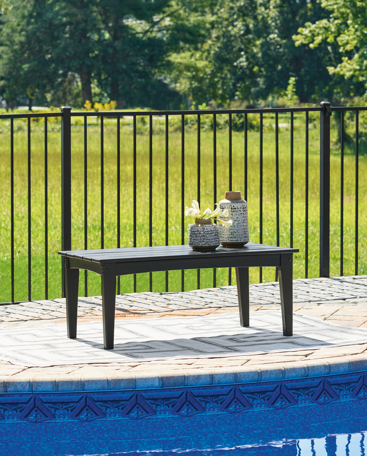 Furniture City Biloxi - Ashley Furniture - Hyland wave Outdoor - Rectangular Cocktail Table / Black - P108-701