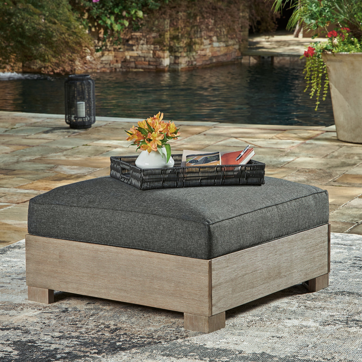 Furniture City Biloxi - Ashley Furniture - Citrine Park Outdoor - Ottoman with Cushion / Brown/Charcoal - P660-814