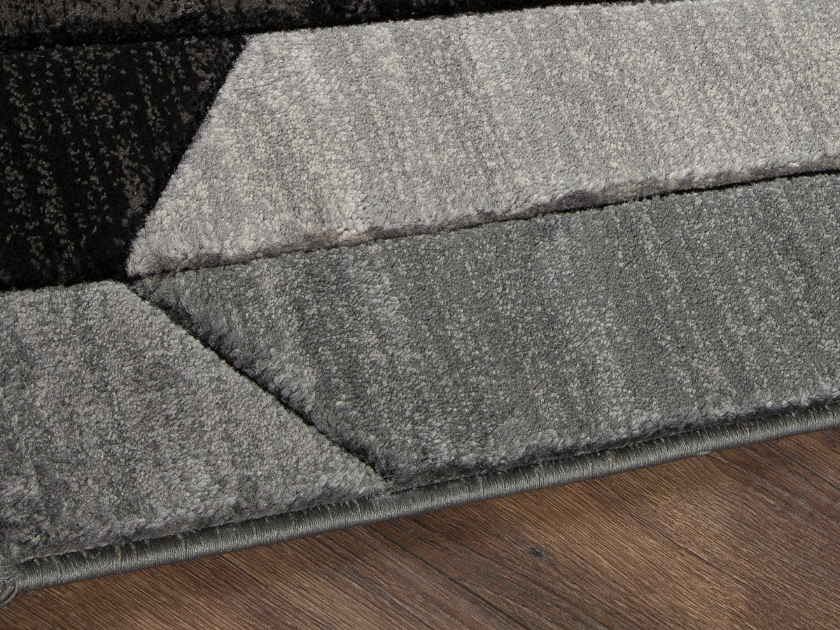 Furniture City Biloxi - Ashley Furniture - Chayse Rug - 6'6" x 9'6" Rug / Black/Gray - R403461