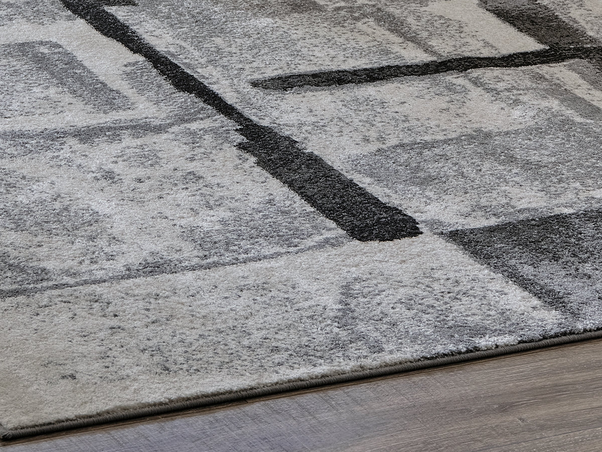 Furniture City Biloxi - Ashley Furniture - Brycebourne Rug - 5'3" x 7'7" Rug / Black/Cream/Gray - R404982