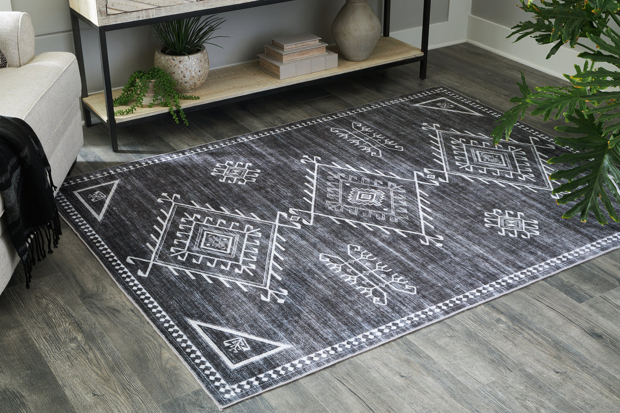 Furniture City Biloxi - Ashley Furniture - Arloman Rug - 5' x 7' Washable Rug / Black/Cream/Gray - R405932