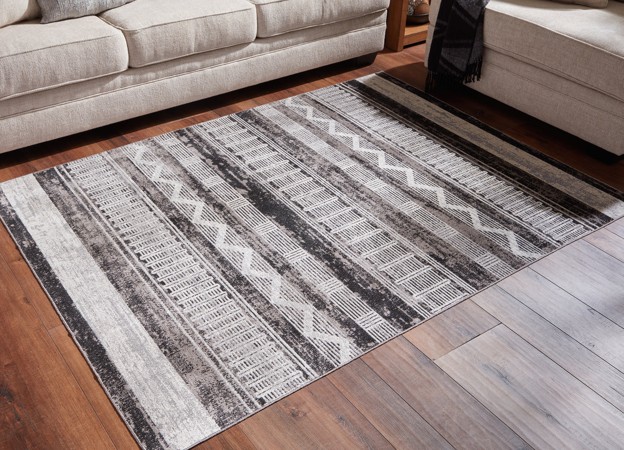 Furniture City Biloxi - Ashley Furniture - Henchester Rug - 5' x 7' Washable Rug / Multi - R405992