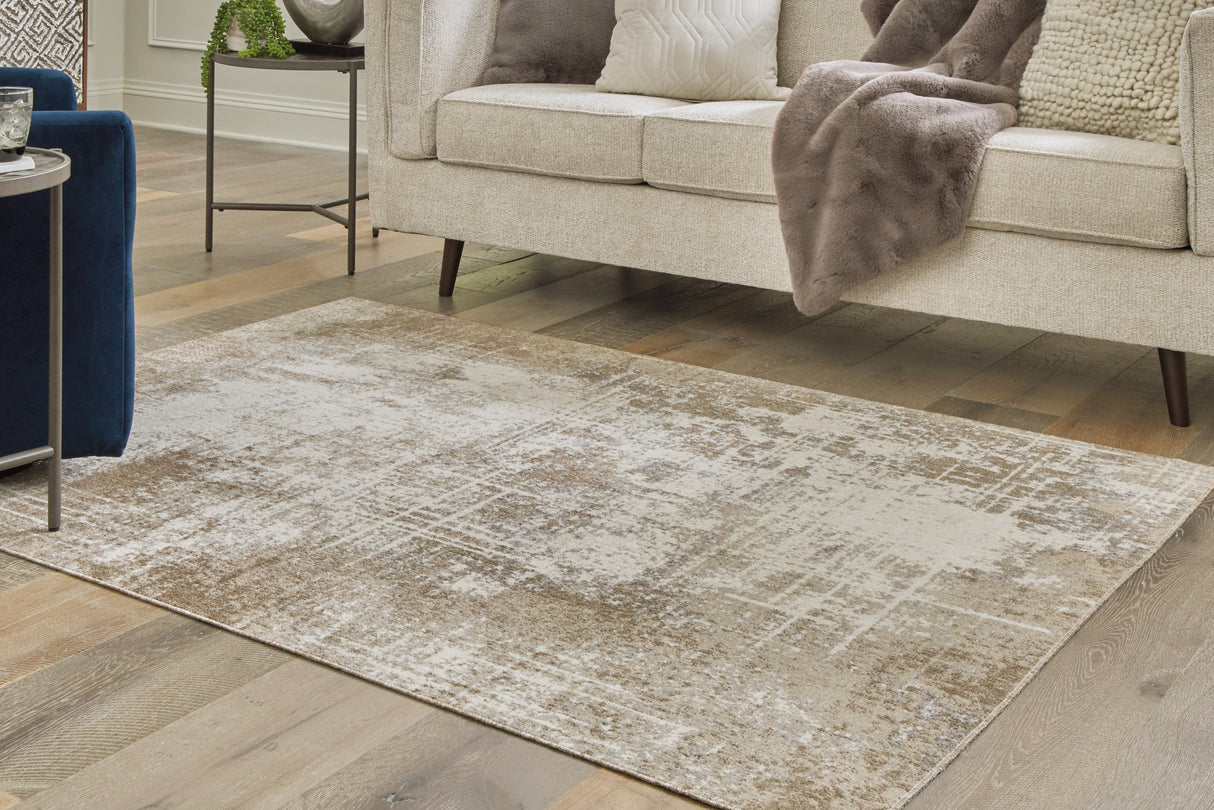 Furniture City Biloxi - Ashley Furniture - Grifflain Rug - 5'1" x 7' Washable Rug / Tan/Brown/Gray - R406232
