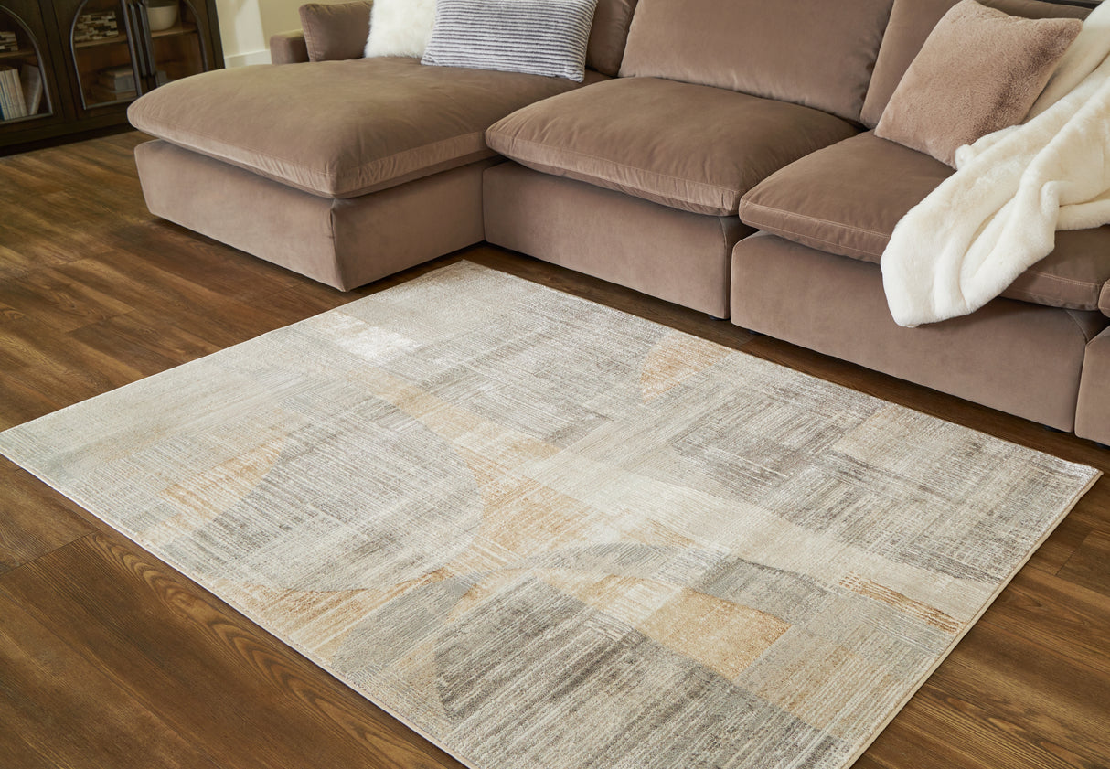 Furniture City Biloxi - Ashley Furniture - Truward Rug - 5' x 7' Rug / Linen/Gray/Caramel - R406472