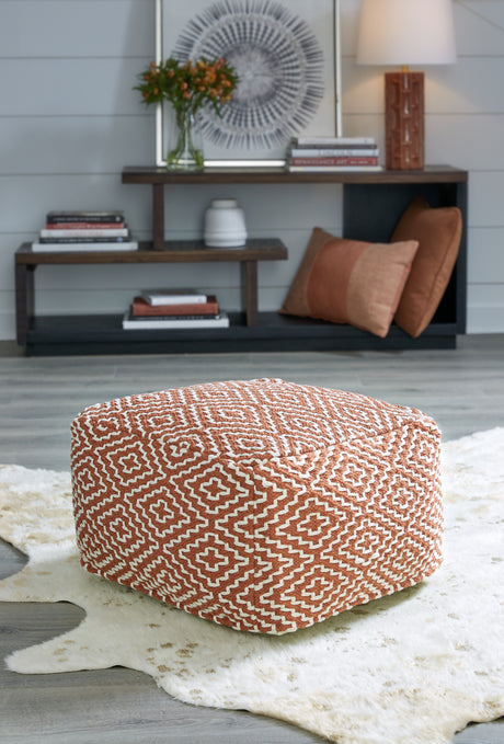 Furniture City Biloxi - Ashley Furniture - Brynnsen Pouf - Pouf / Rust/Ivory - A1001056