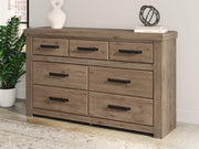 Furniture City Biloxi - Ashley Furniture - Oliandon Bedroom - Seven Drawer Dresser / Light Brown - PCB2844-31