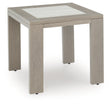 Furniture City Biloxi - Ashley Furniture - Kimpton Isle Outdoor - Armless Chair w/Cushion / Brown/Beige - P704-846