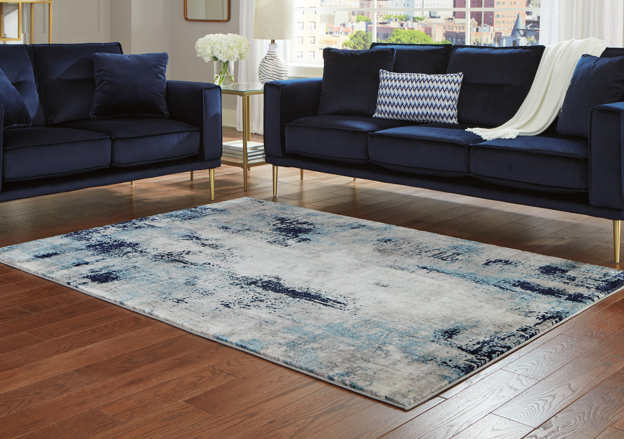 Furniture City Biloxi - Ashley Furniture - Leonelle Rug - 7'10" x 10' Rug / White/Blue/Gray - R404871