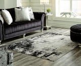 Furniture City Biloxi - Ashley Furniture - Zekeman Rug - 7'10" x 10' Rug / Black/Cream/Gray - R404921