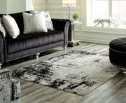 Furniture City Biloxi - Ashley Furniture - Zekeman Rug - 7'10" x 10' Rug / Black/Cream/Gray - R404921
