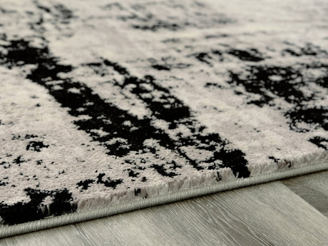 Furniture City Biloxi - Ashley Furniture - Zekeman Rug - 5'3" x 7'7" Rug / Black/Cream/Gray - R404922