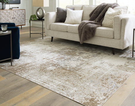 Furniture City Biloxi - Ashley Furniture - Grifflain Rug - 7'10" x 10'3" Washable Rug / Tan/Brown/Gray - R406231