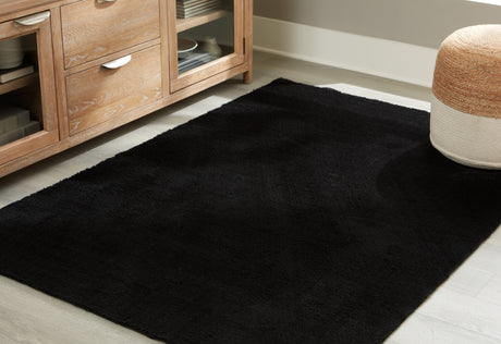 Furniture City Biloxi - Ashley Furniture - Anaben Rug - 8' x 10'1" Washable Rug / Black - R406311