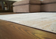 Furniture City Biloxi - Ashley Furniture - Truward Rug - 8' x 10' Rug / Linen/Gray/Caramel - R406471