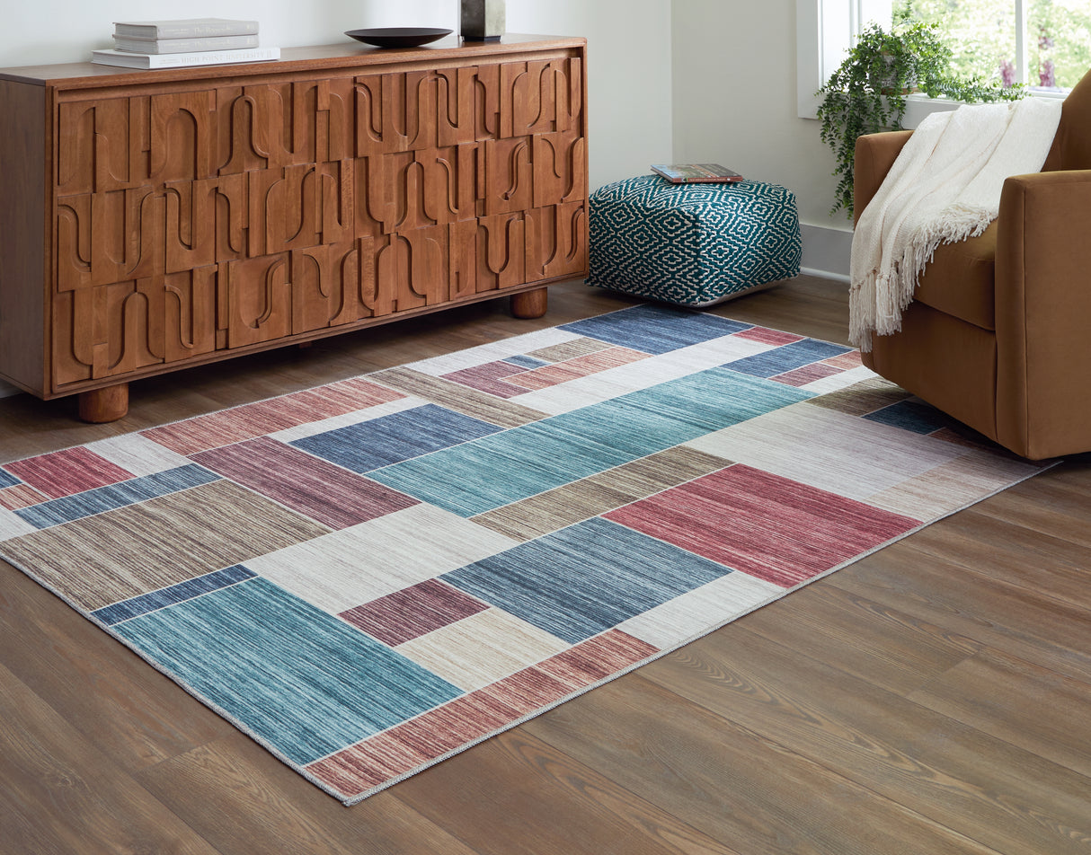 Furniture City Biloxi - Ashley Furniture - Numore Rug - 5'2" x 6'11" Washable Rug / Multi - R406662