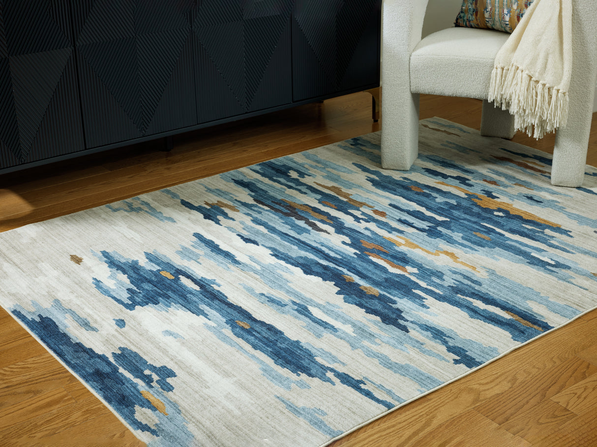 Furniture City Biloxi - Ashley Furniture - Vinlett Rug - 5' x 7' Washable Rug / Cream/Blue/Brown - R407042