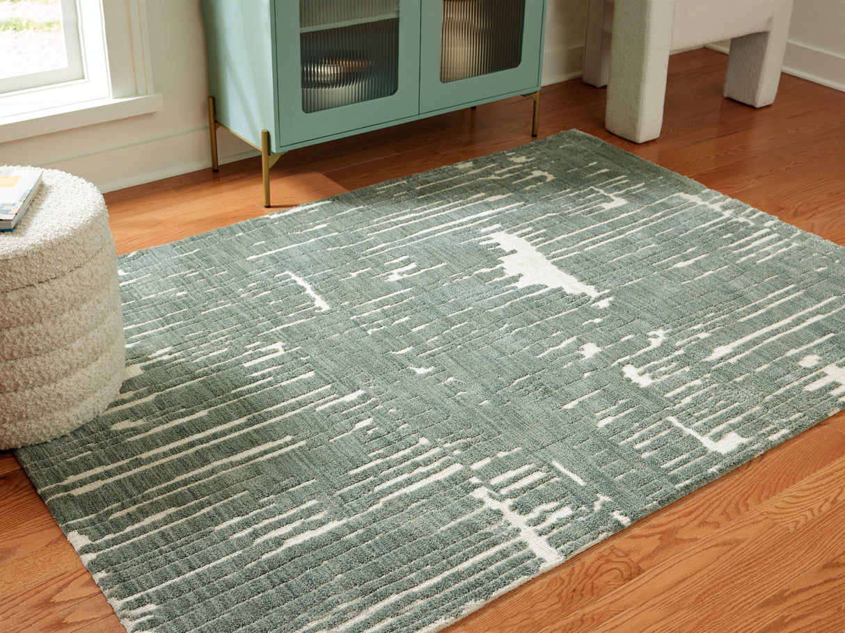 Furniture City Biloxi - Ashley Furniture - Cayworth Rug - 5' x 7' Rug / Teal/White - R407092