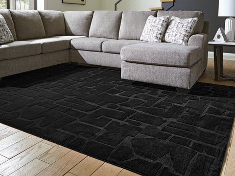 Furniture City Biloxi - Ashley Furniture - Gibbswell Rug - Washable 5' x 7' Area Rug / Black - R407462