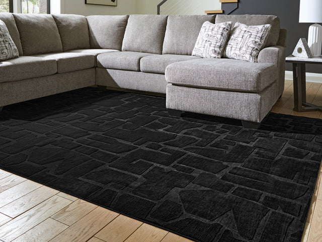 Furniture City Biloxi - Ashley Furniture - Gibbswell Rug - Washable 5' x 7' Area Rug / Black - R407462