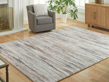 Furniture City Biloxi - Ashley Furniture - Nace Rug - 7'6" x 9'6" Area Rug / Gray/Brown/White - R407471