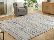 Furniture City Biloxi - Ashley Furniture - Nace Rug - 7'6" x 9'6" Area Rug / Gray/Brown/White - R407471