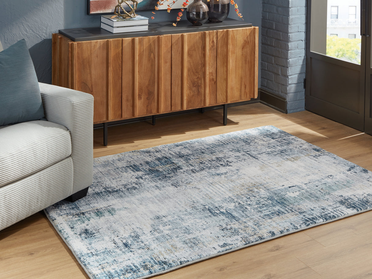 Furniture City Biloxi - Ashley Furniture - Arlenmont Rug - 5' x 7' Area Rug / Blue/White/Brown - R407482
