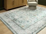 Furniture City Biloxi - Ashley Furniture - Ladstoney Rug - 5' x 7' Area Rug / Teal/Beige/Ochre - R407502