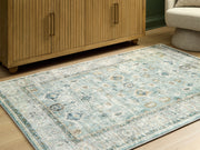 Furniture City Biloxi - Ashley Furniture - Ladstoney Rug - 5' x 7' Area Rug / Teal/Beige/Ochre - R407502
