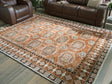 Furniture City Biloxi - Ashley Furniture - Qaabiz Rug - 5' x 7' Area Rug / Sienna/Ivory/Black - R407522