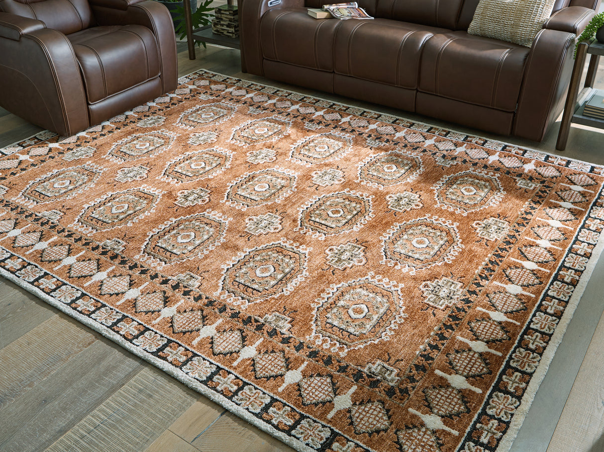 Furniture City Biloxi - Ashley Furniture - Qaabiz Rug - 5' x 7' Area Rug / Sienna/Ivory/Black - R407522