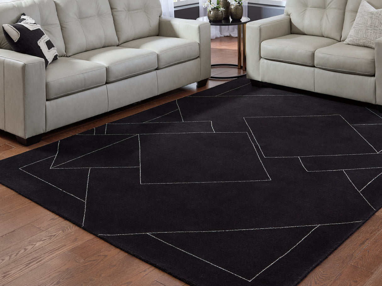 Furniture City Biloxi - Ashley Furniture - Marav Rug - 7'8" x 10' Area Rug / Black/White - R407531