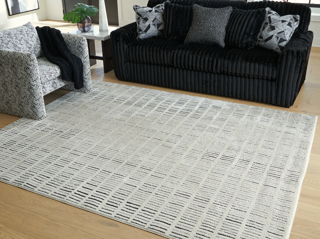 Furniture City Biloxi - Ashley Furniture - Turinwith Rug - 7'10" x 9'10" Area Rug / Ivory/Black - R407551