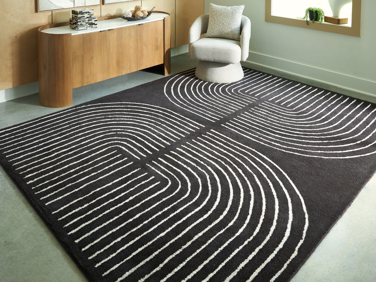Furniture City Biloxi - Ashley Furniture - Eldonmore Rug - 7'8" x 10' Area Rug / Black/Ivory - R407571