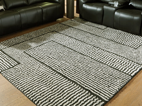 Furniture City Biloxi - Ashley Furniture - Kurtmen Rug - 5' x 7' Area Rug / Black/Ivory - R407592