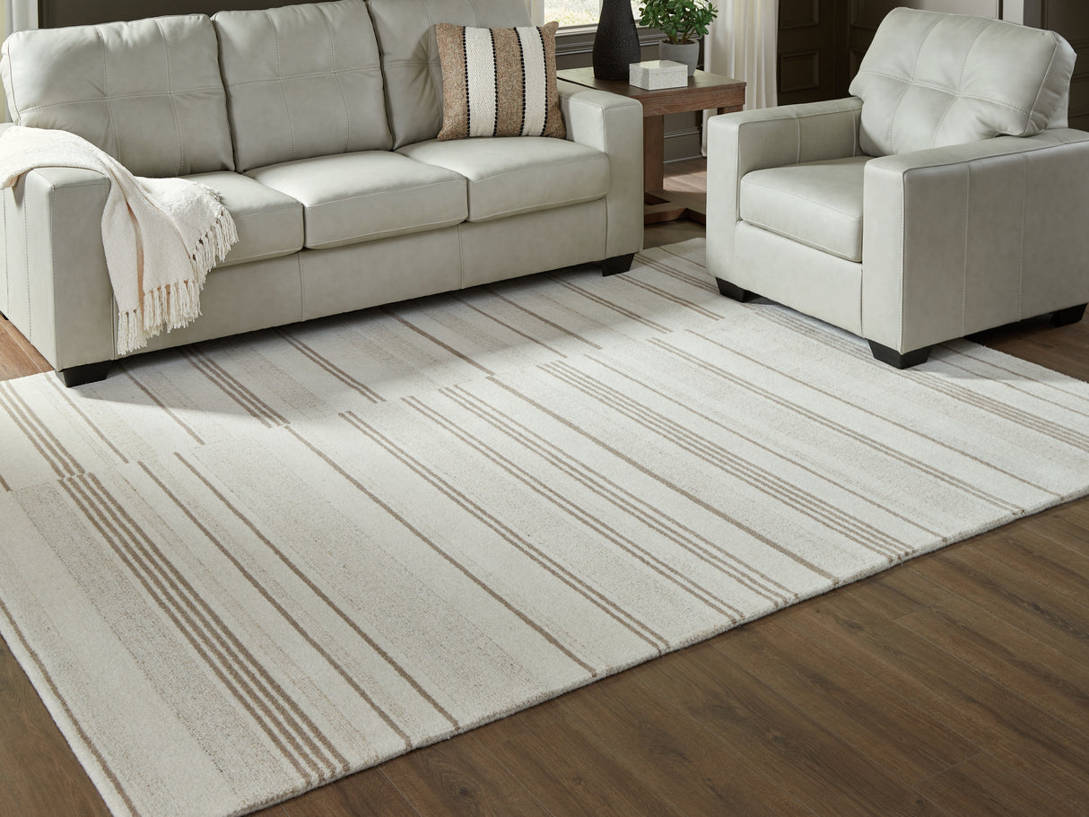 Furniture City Biloxi - Ashley Furniture - Gadence Rug - 7'8" x 10' Area Rug / Ivory/Tan - R407641