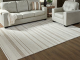 Furniture City Biloxi - Ashley Furniture - Gadence Rug - 7'8" x 10' Area Rug / Ivory/Tan - R407641