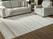 Furniture City Biloxi - Ashley Furniture - Gadence Rug - 7'8" x 10' Area Rug / Ivory/Tan - R407641