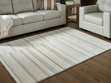 Furniture City Biloxi - Ashley Furniture - Gadence Rug - 5' x 7' Area Rug / Ivory/Tan - R407642