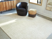 Furniture City Biloxi - Ashley Furniture - Wolbert Rug - 7'8" x 10' Area Rug / Tan/Ivory - R407661