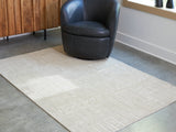 Furniture City Biloxi - Ashley Furniture - Wolbert Rug - 5' x 7' Area Rug / Tan/Ivory - R407662