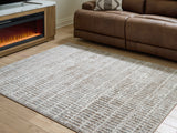 Furniture City Biloxi - Ashley Furniture - Fuadwick Rug - 7'10" x 10' Area Rug / Multi - R407691