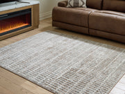 Furniture City Biloxi - Ashley Furniture - Fuadwick Rug - 7'10" x 10' Area Rug / Multi - R407691