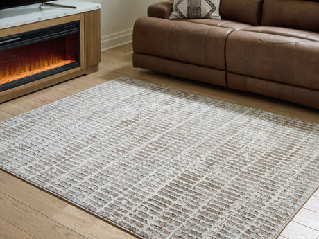 Furniture City Biloxi - Ashley Furniture - Fuadwick Rug - 7'10" x 10' Area Rug / Multi - R407691