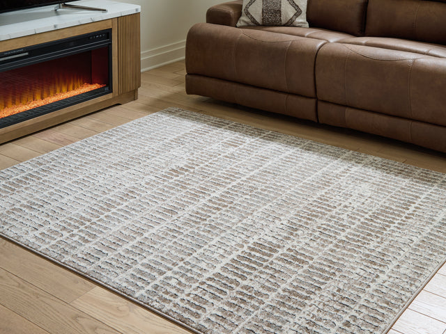 Furniture City Biloxi - Ashley Furniture - Fuadwick Rug - 7'10" x 10' Area Rug / Multi - R407691