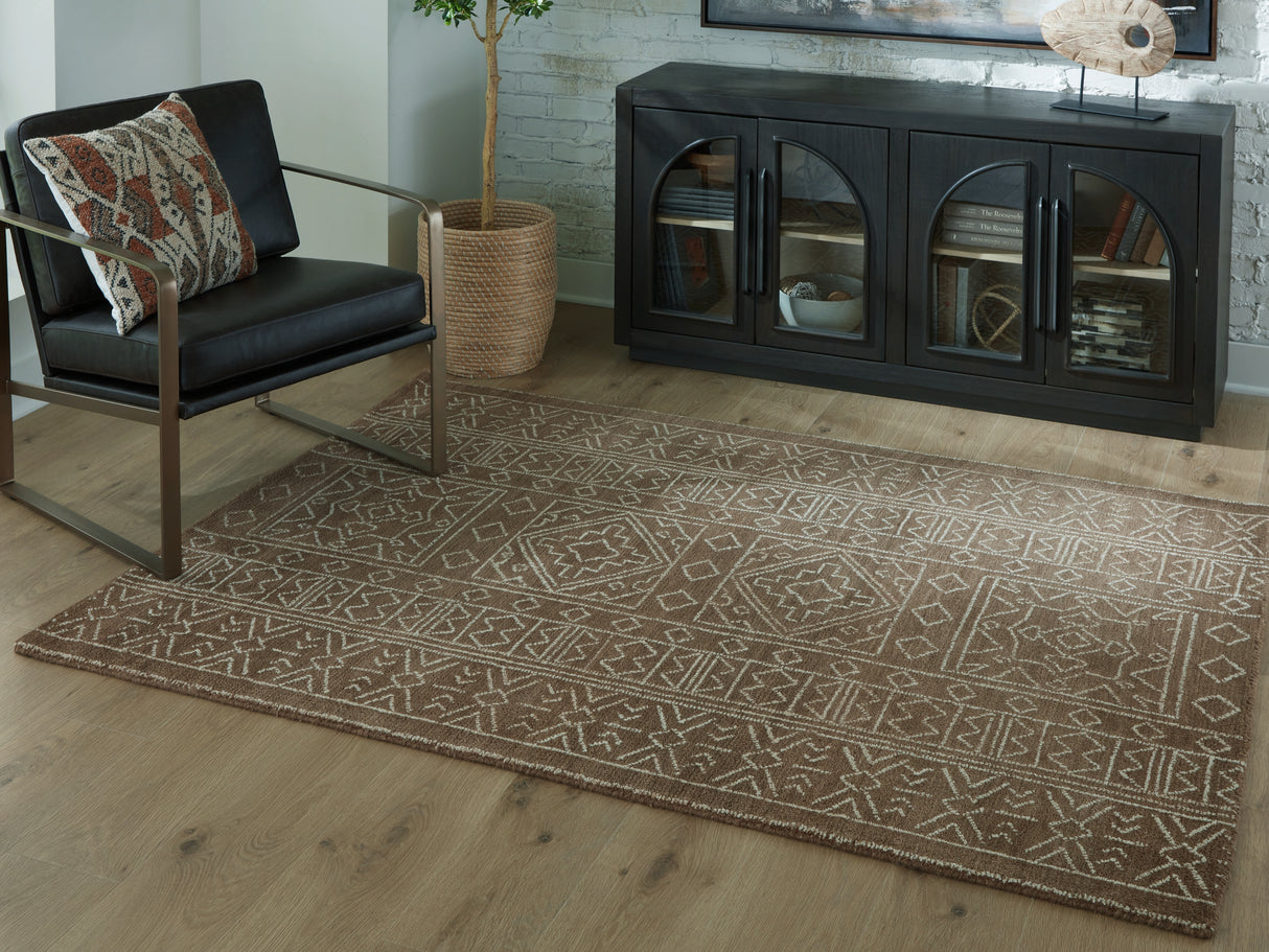 Furniture City Biloxi - Ashley Furniture - Merrittman Rug - 5' x 7' Area Rug / Brown/Ivory - R407702