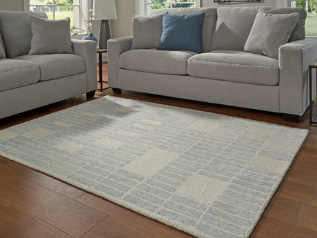 Furniture City Biloxi - Ashley Furniture - Dylanton Rug - 5' x 7' Area Rug / Ivory/Blue - R407812